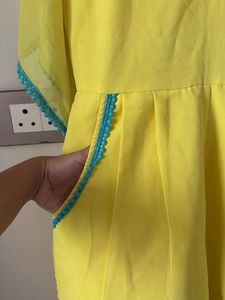 Vibrant Yellow jumpsuit with Teal Trim