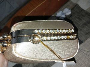 Elegant Gold Embossed Clutch Bag