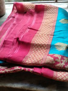 Elegant Teal and Maroon printed Saree.