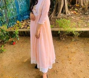 Elegant Peach Kurta with Intricate Embroidery