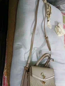 Chic Taupe Textured Handbag with Scarf Accent