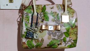 Glossy PolyVinyl material Floral Print Handbag