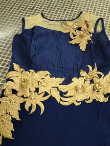 Elegant Navy Blue Dress with Gold Embellishments