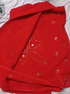 Vibrant Red Saree with Golden Embellishments