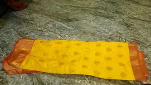 Vibrant Yellow Saree with Orange Blouse