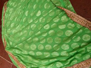 Vibrant lehenga Green Saree with Gold Border