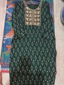 Elegant Green Kurta with Embellished Neckline