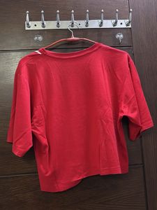 Red coloured girls printed crop top