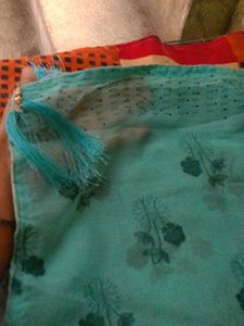 Elegant Teal Saree with Floral Print