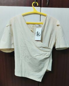 Chic Beige Wrap Top