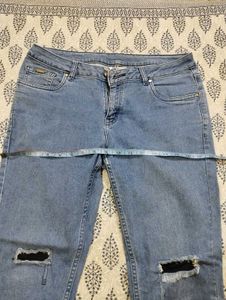 Distressed Blue Narrow Jeans