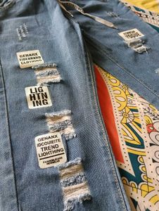 Distressed Blue Denim Jeans