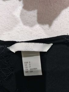 H &amp; M : Sleek Black Spaghetti Strap Tank Top