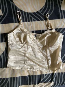 Lace-trimmed sweetheart neckline