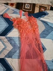Orange Net Embellished Lehenga Choli