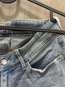 Light Wash Distressed Denim Jeans