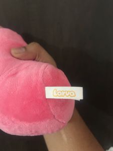 pink Larva character plush keychain featuring