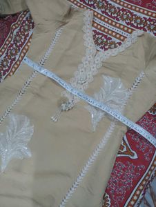 Elegant Beige Kurta with White Lace Trim