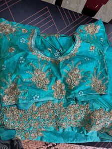 Beautiful Teal Embroidered saree with 34inch blous