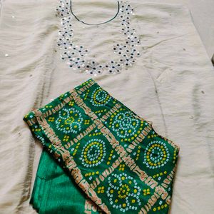 Elegant Cream  dress material with Green Bandhani