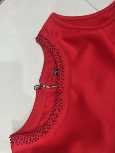 Elegant Red Dress with Embellished Neckline