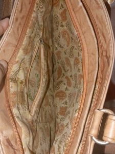 Stylish Tan Shoulder Bag with Scarf Accent