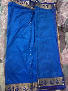 Vibrant Blue Silk Saree with Peacock Motif