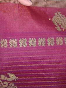 Elegant Maroon Striped Saree with Peacock Motifs