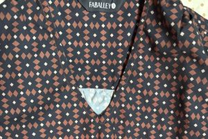 FABALLEY Bow Peplum Top