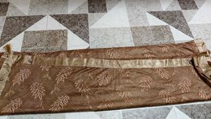 Elegant Brown Saree with Leaf Motif