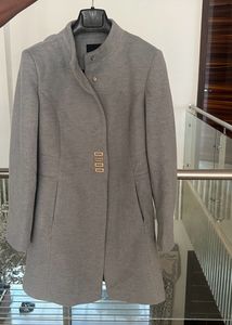madame’s ice blue overcoat