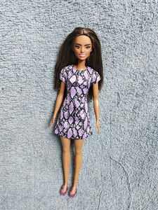 Stylish Barbie Doll in Purple Snake Print Dress