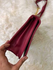 sabhyasachi Red Handbag with Gold Tiger Accent
