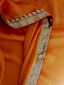 Elegant Orange saree with Embellishments