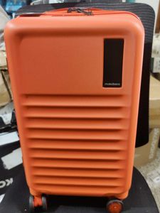 Mokobara Orange Hardshell aisle trunk Suitcase