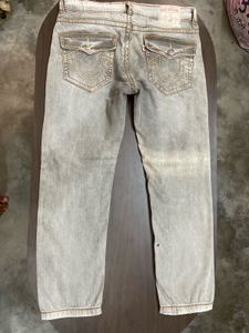 TRUE RELIGION WITH SMALL INK DOT AT BACK