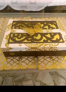 12. Decorative Gift Box with Butterfly Accent
