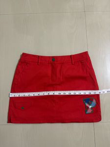 Red Mini Skirt with 'P' Emblem