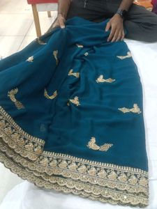 Stunning Teal Saree with Gold Embroidery