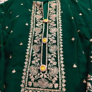 Elegant Green Embroidered Shrara suit