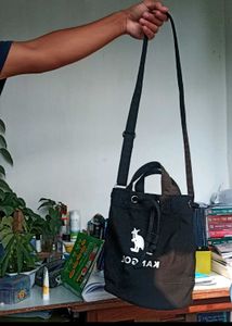 kangol bucket drawstring sling bag