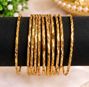 Set of 12 Elegant Gold Bangles