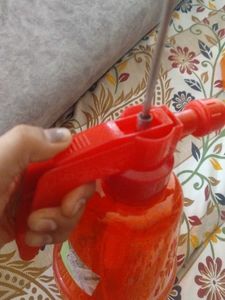 Red Spray Bottle for cleaning windows