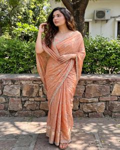 Elegant Peach Embellished Saree