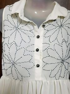 Cream Sleeveless Floral Top