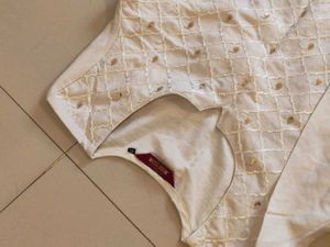 WHITE KURTA WITH GOLDEN DETAILING