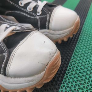 Converse High-Top Sneakers.