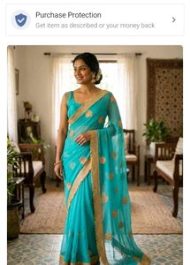 Elegant Teal Saree with Gold Embellishments