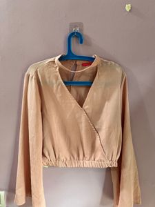 peach bell sleeved crop top