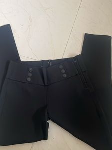 High-Waisted Black Pants with Button Detail